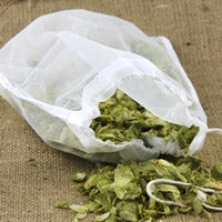 A drawstring-top nylon hop bag of fine mesh, 8″ x 9 ¼″.