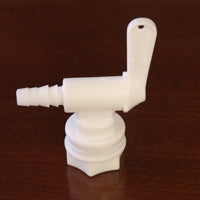 Spout fits in neck of bottles, with one gasket on outside of bucket, fits 5/16" 7/16" and 3/8" tubing. Improved design - tubing doesn't turn when handle turns